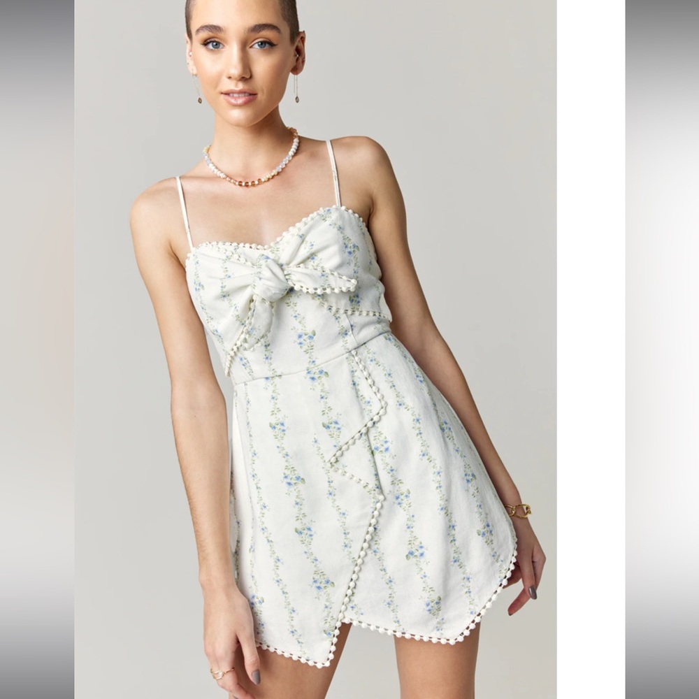 Brand new Francesca’s white/blue romper.